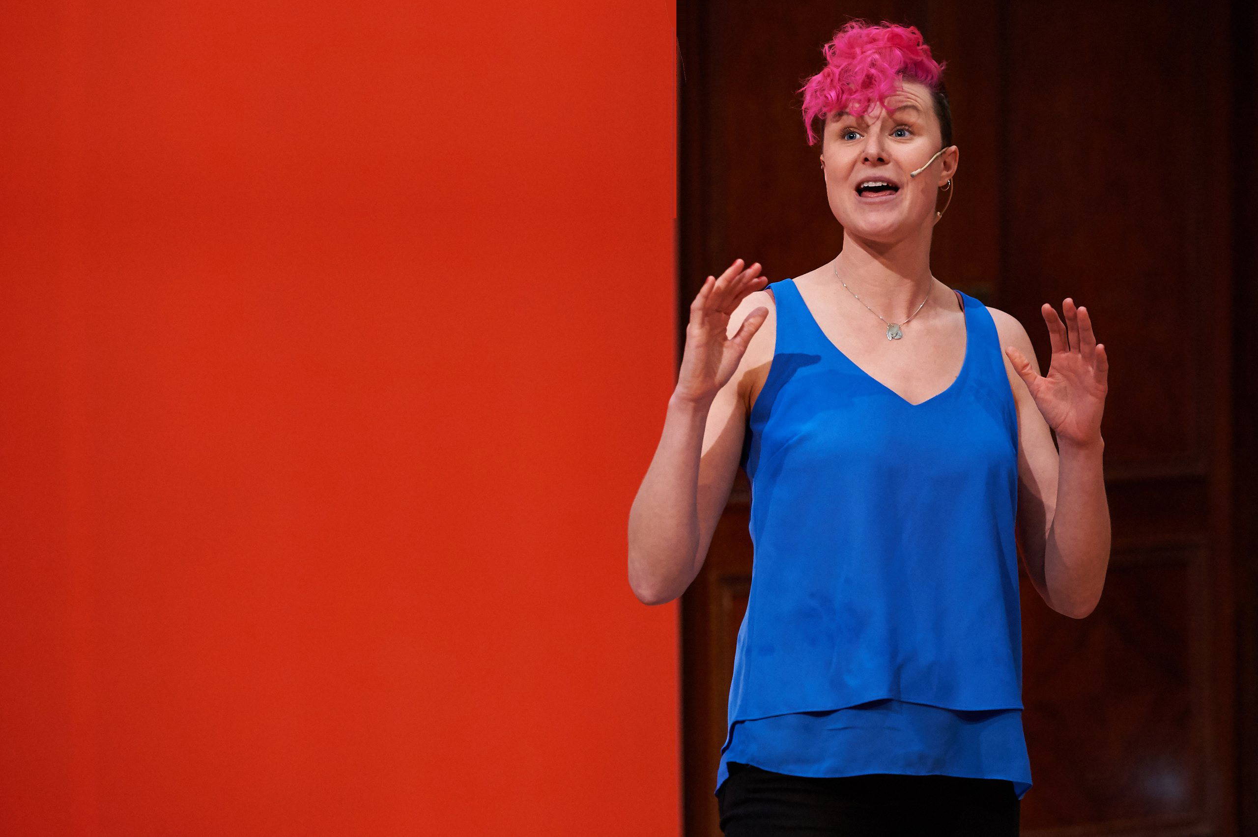 Anna McNuff giving a keynote talk on stage