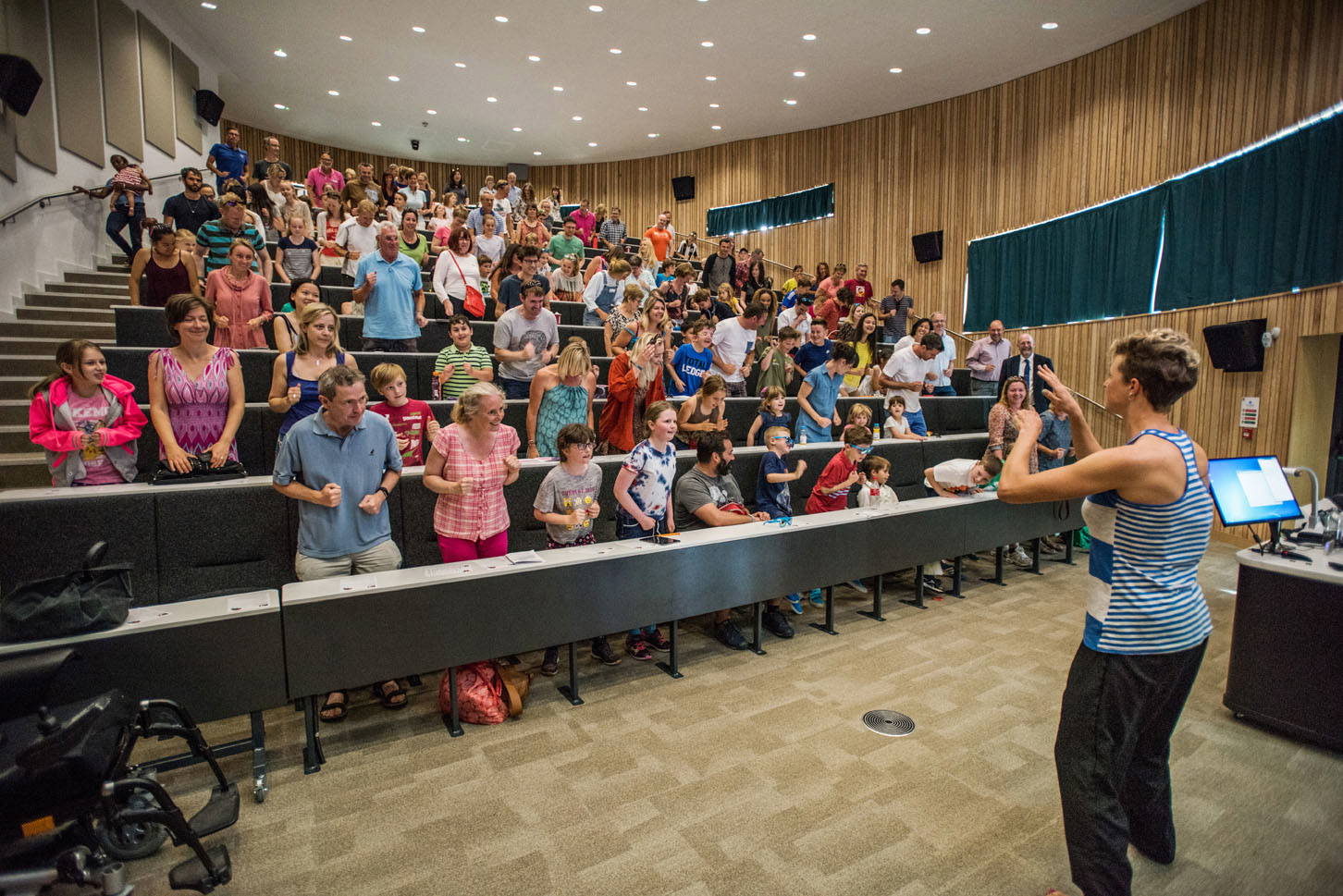 Anna McNuff getting students and parents on their feet during a school talk