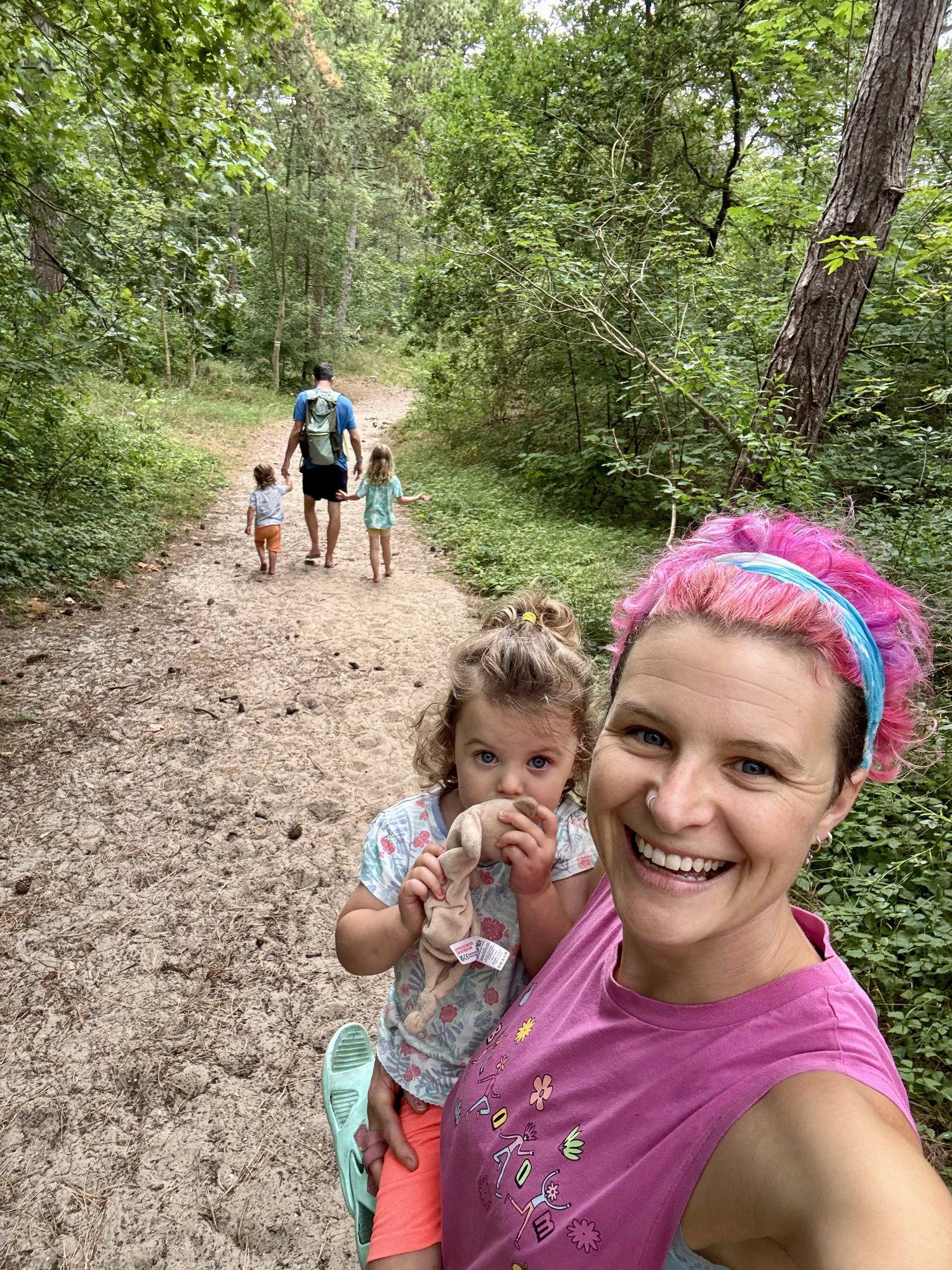 Anna McNuff on a woodland walk with her young daughter